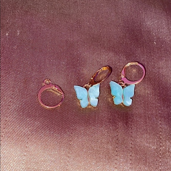 Urban Outfitters Jewelry - Light blue butterfly earrings